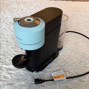 Nespresso Black and Light Blue Coffee Maker